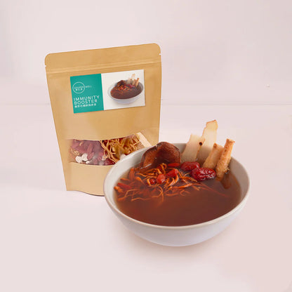 Souper Well Immunity Booster kraft pouch and bowl of herbal soup